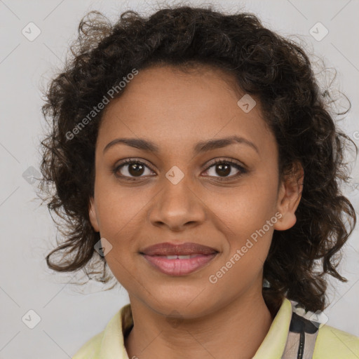 Joyful black young-adult female with medium  brown hair and brown eyes