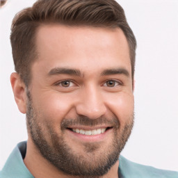 Joyful white young-adult male with short  brown hair and brown eyes