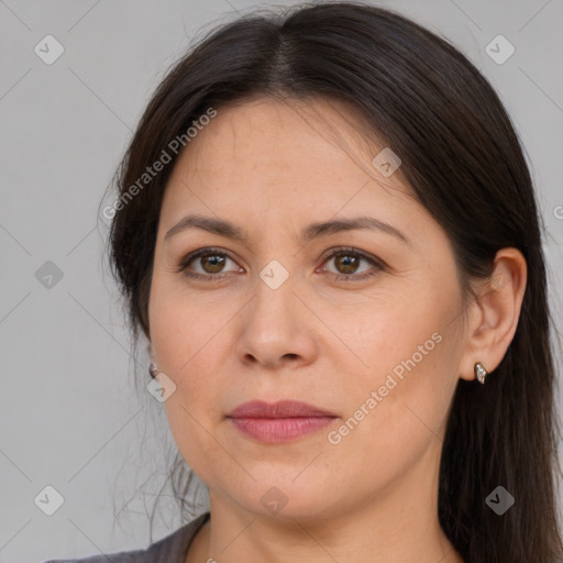 Joyful white adult female with medium  brown hair and brown eyes