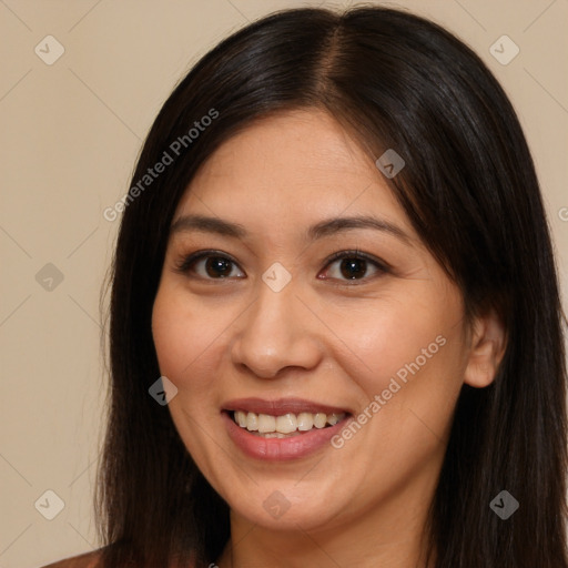 Joyful white young-adult female with long  brown hair and brown eyes