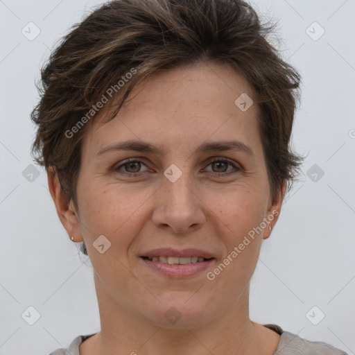 Joyful white adult female with short  brown hair and brown eyes