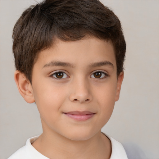 Joyful white child male with short  brown hair and brown eyes