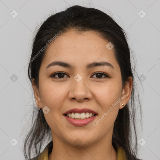 Joyful latino young-adult female with long  brown hair and brown eyes