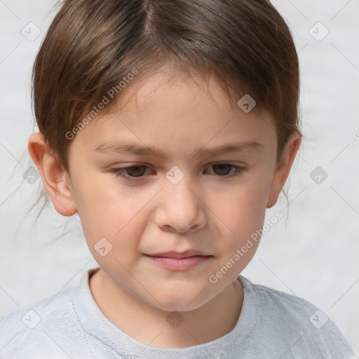 Joyful white child male with short  brown hair and brown eyes