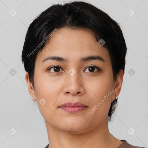 Joyful asian young-adult female with short  black hair and brown eyes