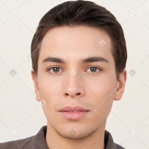 Neutral white young-adult male with short  brown hair and brown eyes