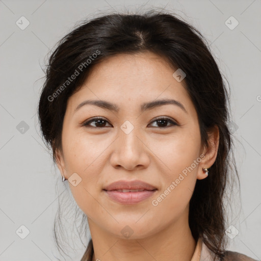 Joyful asian young-adult female with medium  brown hair and brown eyes