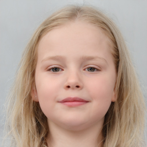 Joyful white child female with long  brown hair and blue eyes