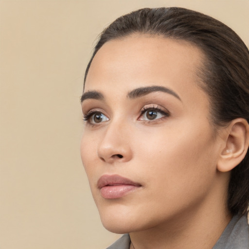 Neutral white young-adult female with medium  brown hair and brown eyes