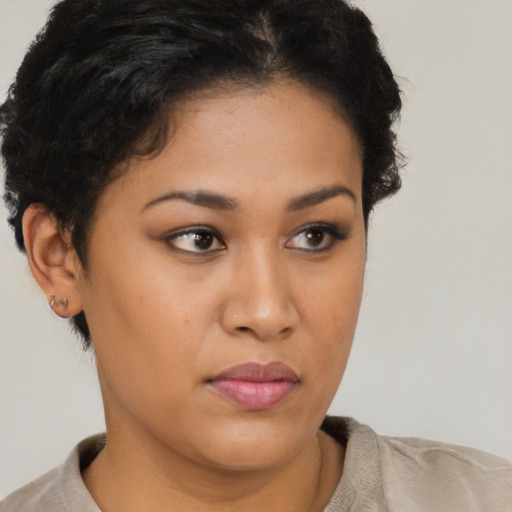 Neutral latino young-adult female with short  brown hair and brown eyes