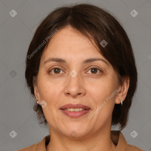 Joyful white adult female with medium  brown hair and brown eyes