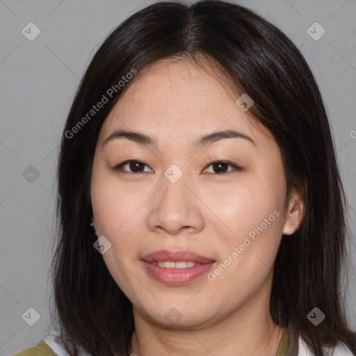 Joyful asian young-adult female with medium  brown hair and brown eyes