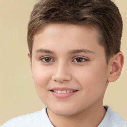 Joyful white child male with short  brown hair and brown eyes