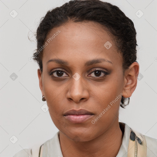 Neutral black young-adult female with short  brown hair and brown eyes