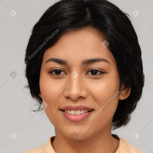 Joyful asian young-adult female with medium  black hair and brown eyes