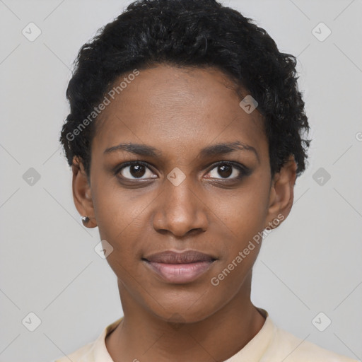 Joyful black young-adult female with short  black hair and brown eyes