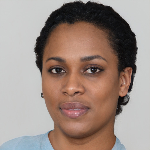 Neutral black young-adult female with short  black hair and brown eyes