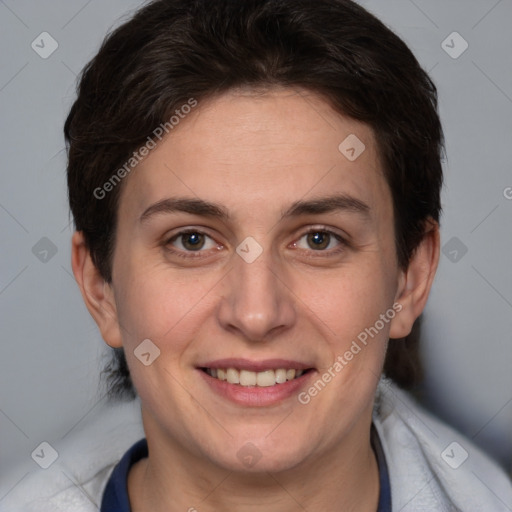 Joyful white adult female with short  brown hair and brown eyes