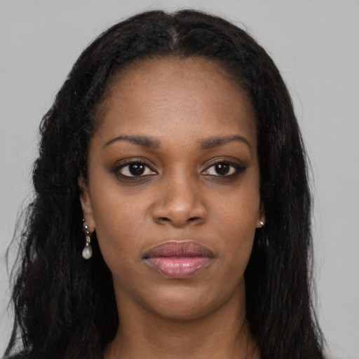 Neutral black young-adult female with long  black hair and brown eyes