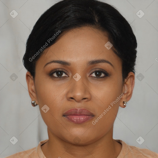 Joyful latino young-adult female with short  brown hair and brown eyes