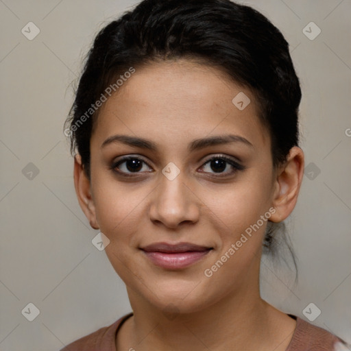 Joyful latino young-adult female with short  brown hair and brown eyes