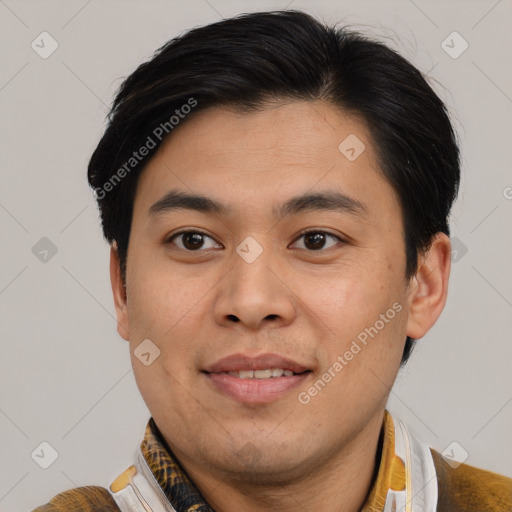 Joyful asian young-adult male with short  brown hair and brown eyes