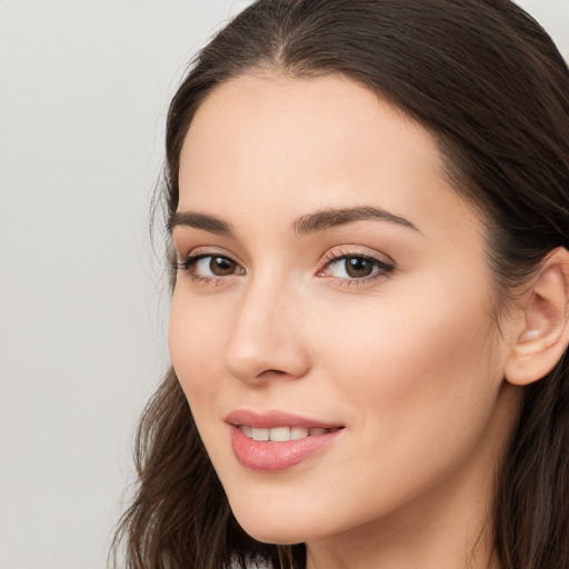 Neutral white young-adult female with long  brown hair and brown eyes