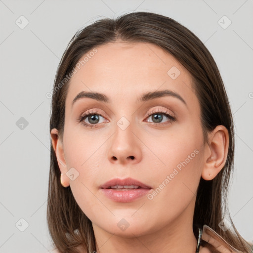 Neutral white young-adult female with long  brown hair and grey eyes