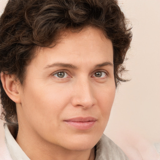 Joyful white young-adult male with medium  brown hair and brown eyes