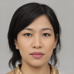 Neutral asian young-adult female with medium  black hair and brown eyes