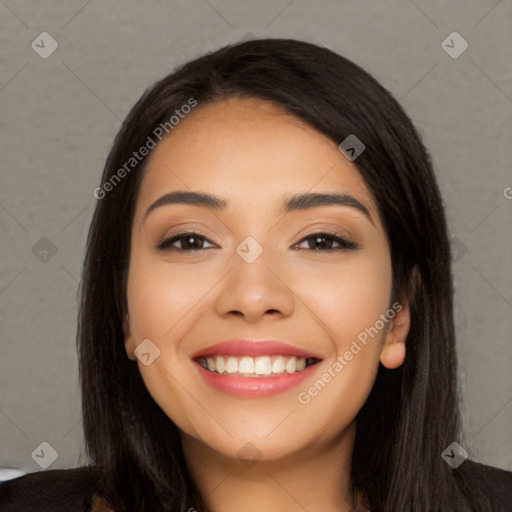 Joyful latino young-adult female with long  black hair and brown eyes