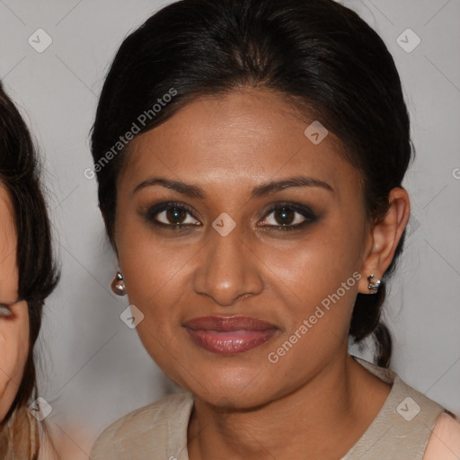 Joyful black young-adult female with medium  brown hair and brown eyes