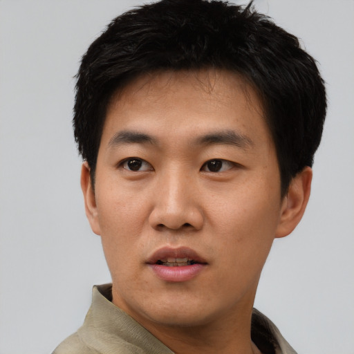 Neutral asian young-adult male with short  black hair and brown eyes