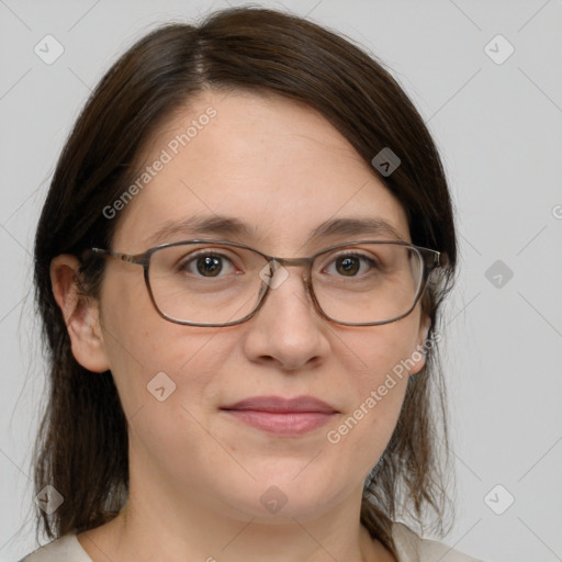 Joyful white adult female with medium  brown hair and grey eyes