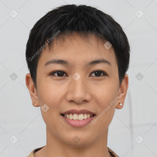 Joyful asian young-adult female with short  black hair and brown eyes