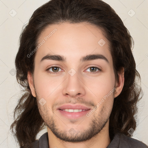 Joyful white young-adult male with medium  brown hair and brown eyes