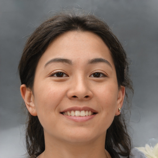 Joyful white young-adult female with medium  brown hair and brown eyes