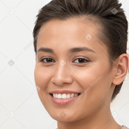 Joyful white young-adult female with short  brown hair and brown eyes