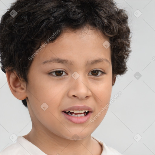 Joyful white child male with short  brown hair and brown eyes