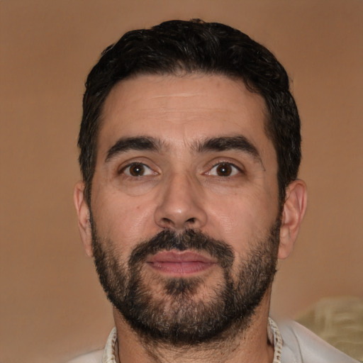Neutral white adult male with short  black hair and brown eyes