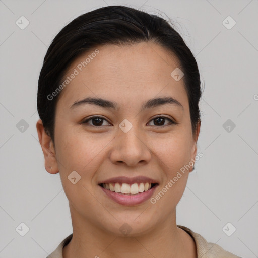 Joyful asian young-adult female with short  brown hair and brown eyes