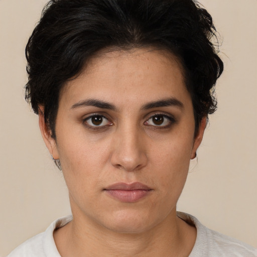 Neutral white young-adult female with short  brown hair and brown eyes