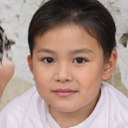 Joyful white child female with short  brown hair and brown eyes