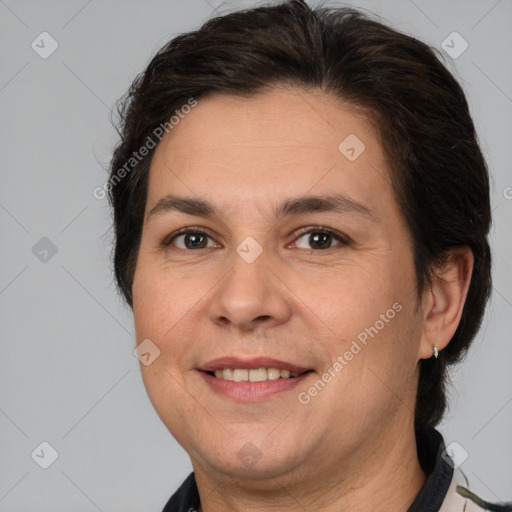 Joyful white adult female with short  brown hair and brown eyes