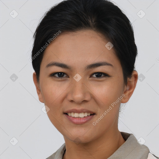 Joyful asian young-adult female with short  brown hair and brown eyes