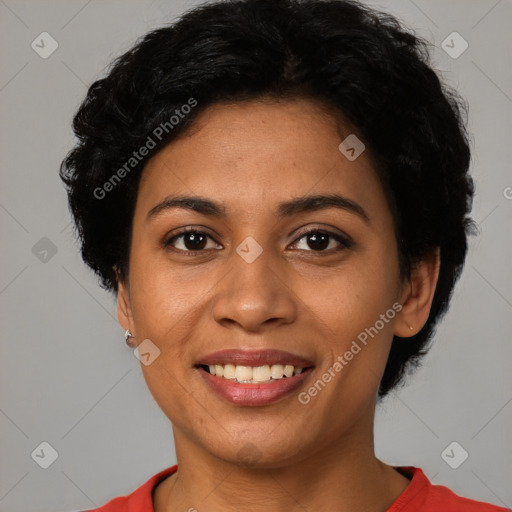 Joyful latino young-adult female with short  black hair and brown eyes