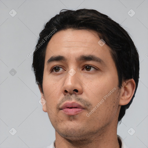 Neutral white adult male with short  black hair and brown eyes