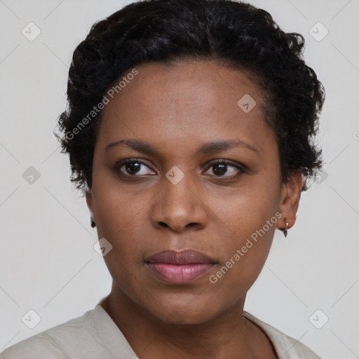 Neutral black young-adult female with short  brown hair and brown eyes