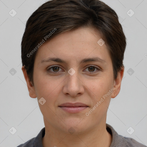 Joyful white young-adult female with short  brown hair and grey eyes