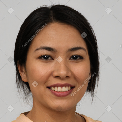 Joyful asian young-adult female with medium  black hair and brown eyes